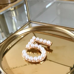 Broche perlas