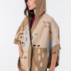 Poncho con capucha estampado Voyage